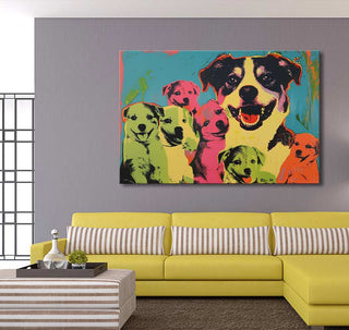 Andy Warhol signature - Dogs 2: Hand-painted pop art canvas depicting smiling dogs, mounted above a yellow sectional sofa with striped throw pillows.