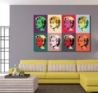 Andy Warhol signature - Marylin Monroe 8 pop art canvas, featuring eight vibrant panels, adorns a modern living room with a yellow sectional and striped ottoman.