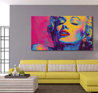 Pop-art canvas depicting Marilyn Monroe, inspired by Andy Warhol, hangs above a yellow sofa. Hand-painted, includes hanging system, UV-protected, no frame needed.