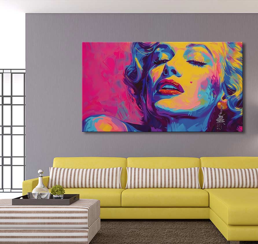Pop-art canvas depicting Marilyn Monroe, inspired by Andy Warhol, hangs above a yellow sofa. Hand-painted, includes hanging system, UV-protected, no frame needed.