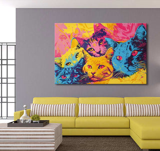 Andy Warhol signature - Cats 3: Five cat faces in vibrant pop art style, hand-painted on canvas, displayed above a yellow sofa in a modern living room.