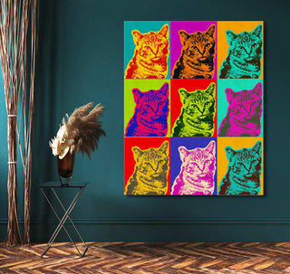 Pop art canvas Andy Warhol signature - Cats 4 with nine cat portraits in vibrant duotone, displayed on a teal wall, enhancing modern interior decor.