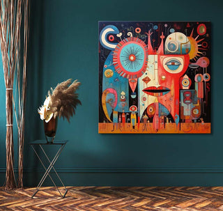 Corneille signature - Dream Head: A vibrant abstract painting with surreal faces and geometric motifs, complemented by minimalist decor including a metal stand and pampas grass.