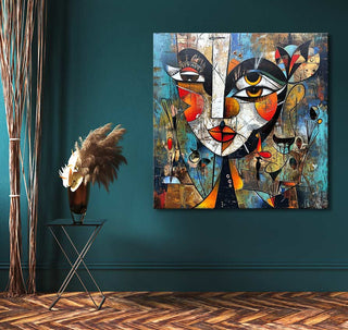 Abstract cubist painting Femme Fatale by Corneille on teal wall, paired with black tripod table and bronze vase, pampas grass, and herringbone floor.