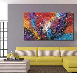 Jackson Pollock signature - Spring Days (260x130cm) abstract oil painting in vibrant colors, displayed above a yellow sofa in a modern living room setting.