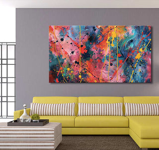 Jackson Pollock signature - Wild Pink painting above a modern, yellow sectional sofa in a contemporary living room, showcasing vibrant abstract expressionism.
