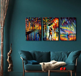 Custom made triptych by Leonid Afremov featuring three impressionistic oil paintings on canvas, depicting romantic scenes, displayed above a teal sofa with decor accents.