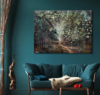 Anselm Kiefer's Waldsteig on teal wall, depicting a forest path, complements teal sofa with throw, creating a moody, organic living room scene.
