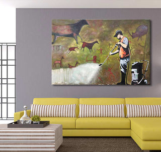 Banksy - Graffiti Cleaner artwork: A worker uses a pressure washer to erase cave-painting figures. Hand-painted, pop art style, ideal for modern interiors.