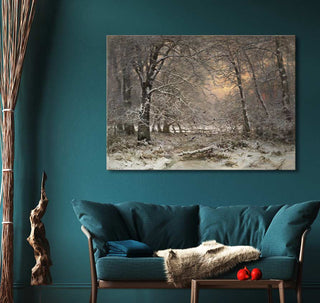 Framed oil painting Louis Apol - Bos bij Winter depicting a snow-covered forest, above a teal loveseat with rustic decor, perfect for classic art lovers.