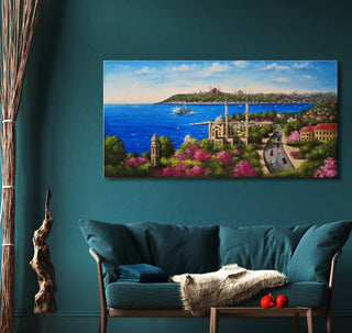 Hand-painted oil painting, Spring in Istanbul, depicting a vibrant coastal cityscape with mosque and clock tower, displayed above a teal sofa.