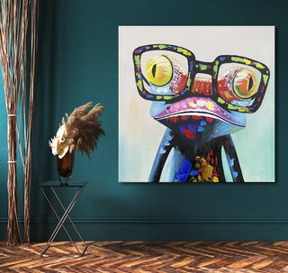 Olieverfschilderij ‘Wise Frog’ toont een gestileerde kikker met grote bril. Opgespannen op houten frame, klaar om op te hangen. Perfect voor kunstliefhebbers.