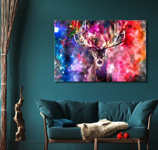 Teal sofa with faux-fur blanket beneath colorful canvas “Hert - Olieverf op canvas,” depicting a stag in a cosmic nebula, enhanced by impressionistic artistry.