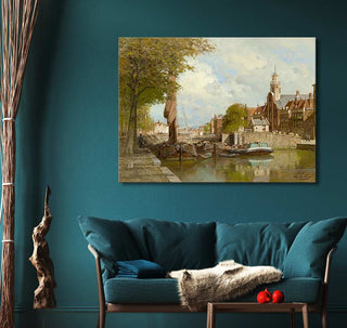 Karel Klinkenberg's Zonnig gezicht op oud Rotterdam oil painting on teal wall above mid-century sofa with faux-fur throw, enhancing a cozy European-inspired interior.