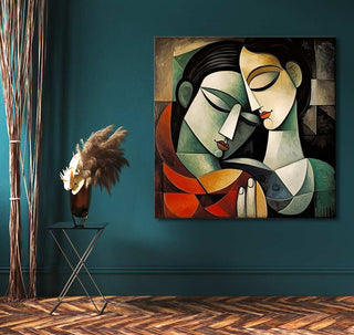 Cubist-style painting, Picasso signature True Lovers, depicting abstract faces and fish, with black metal table and dried reeds, enhancing modern interior design.