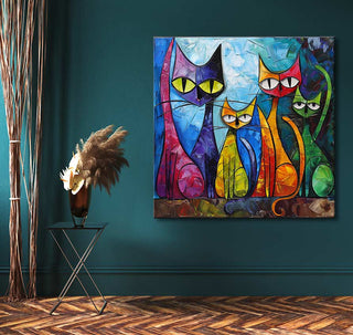 Abstract painting of five cats in cubist style with vibrant hues on teal wall. Cat Lovers 1 by Picasso signature. Hand-painted, ready to hang.