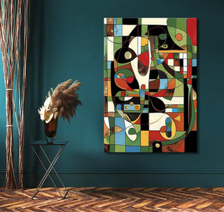 Abstract painting Esthetic Cubism with geometric shapes on a teal wall, alongside a black table with pampas grass, embodying modern minimalist decor.