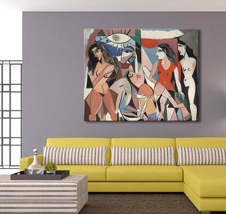 Cubist-style painting, Picasso signature - The Ladies of Avignon 6, featuring abstract female figures, above a mustard-yellow sectional with striped pillows in a modern living room.