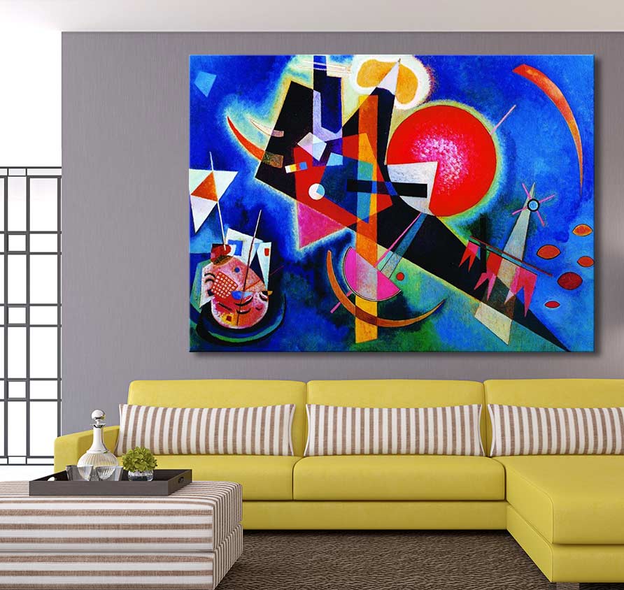 Kandinsky's 'In Blue' dominates a modern living room with a yellow sofa and striped ottoman. The geometric abstract canvas adds vibrant energy to the minimalist decor.