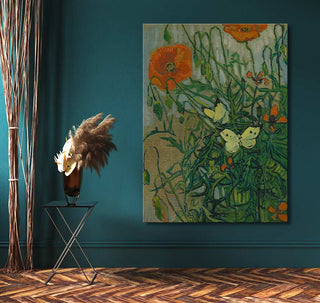 Vincent van Gogh - Butterflies and Poppies painting with vibrant poppies and butterflies, displayed in a modern room with a black metal side table and pampas grass.