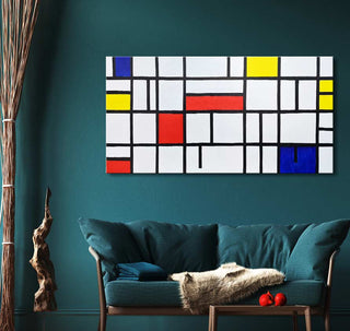 Mondrian-style canvas 'Compositie 2 in Rood, Geel en Blauw' on teal wall. Two-seat sofa, wooden table with red spheres, natural decor elements.