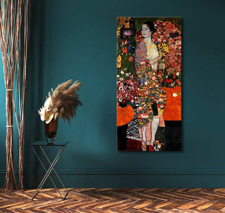 Gustav Klimt – The Dancer: Art-Nouveau portrait of a woman in colorful fabrics, oil on canvas, displayed in a moody interior with pampas grass.