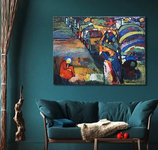 Wassily Kandinsky's Bild mit Häusern painting, featuring colorful abstract houses, hangs above a teal sofa in a modern living room setting.