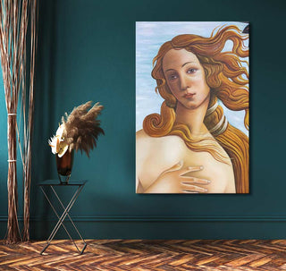Tom Hill's The Head of Venus pop art oil painting on high-quality canvas, depicting Venus's expressive face, leaning against a deep teal wall beside a sleek black table.