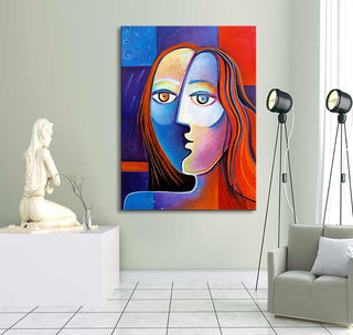 Picasso signature - Pascalle bij Maanlicht (60x90cm), a vibrant cubist portrait, displayed in a modern gallery setting with a sculpture and armchair nearby.