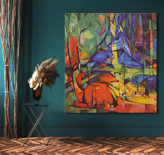 Franz Marc's Herten in het Bos painting features stylized deer in a vibrant, modern interior setting, emphasizing expressive, jewel-toned colors on high-quality canvas.