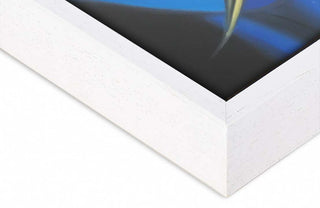 Close-up of a Witte Baklijst, showcasing its white wooden frame corner with a dark, abstract artwork fitted inside, highlighting its sleek 20x40 mm profile.