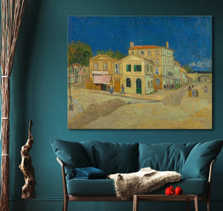 Vincent van Gogh - Het Gele Huis painting above a teal loveseat, styled with driftwood, dried reeds, and a wood table with apples. Perfect for art enthusiasts.