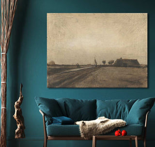 Vincent van Gogh's Landschap in Drenthe painting above a modern teal loveseat with decorative accents in a cozy living room corner.